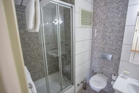 Shower, free toiletries, hair dryer, slippers