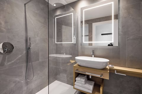 Shower, free toiletries, hair dryer, towels