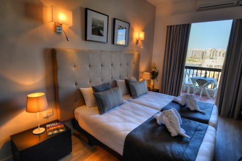 Sea View Room, One double or Two Twins | In-room safe, desk, blackout drapes, iron/ironing board