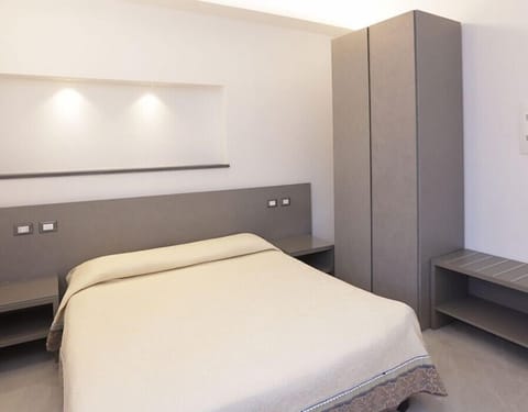 Junior Suite, City View | Premium bedding, minibar, in-room safe, desk