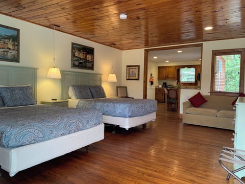 Deluxe Suite, Kitchen, Courtyard Area, | Desk, laptop workspace, iron/ironing board, free WiFi