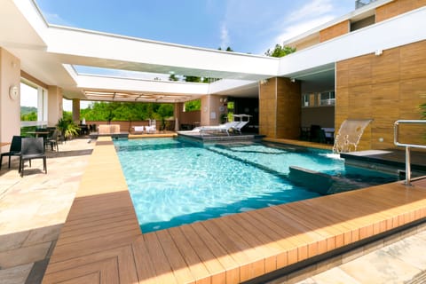 Seasonal outdoor pool, open 10:00 AM to 10:00 PM, sun loungers