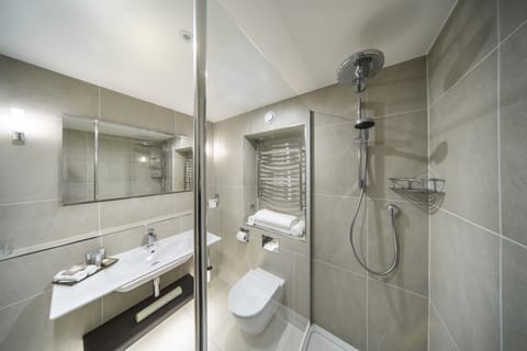 Designer toiletries, hair dryer, bathrobes, slippers