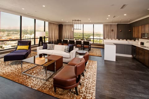 Aspen Tower Presidential Suite | Living area | 50-inch flat-screen TV with cable channels, TV