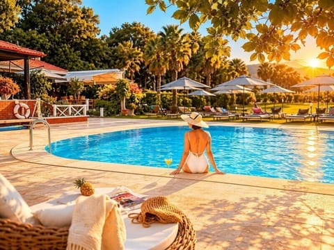 Outdoor pool, pool umbrellas, sun loungers