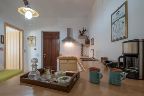 Full-size fridge, stovetop, coffee/tea maker, electric kettle