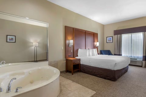 Suite, 1 King Bed, Non Smoking, Jetted Tub | In-room safe, desk, laptop workspace, blackout drapes