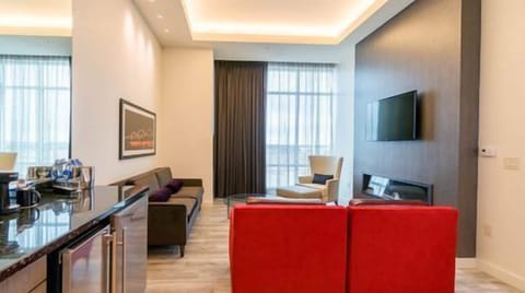 Suite, 1 King Bed (Concierge Suite K) | Premium bedding, in-room safe, desk, iron/ironing board