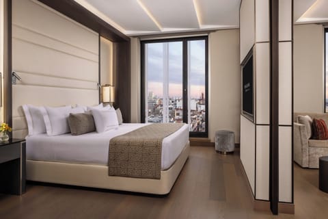 Premium bedding, down comforters, pillowtop beds, minibar