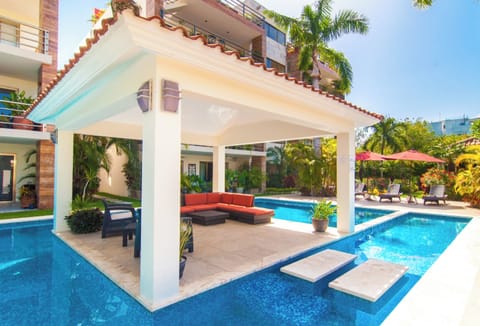 Outdoor pool, pool umbrellas, sun loungers