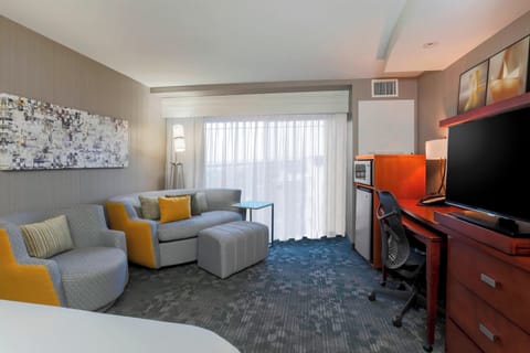 Premium bedding, desk, blackout drapes, iron/ironing board