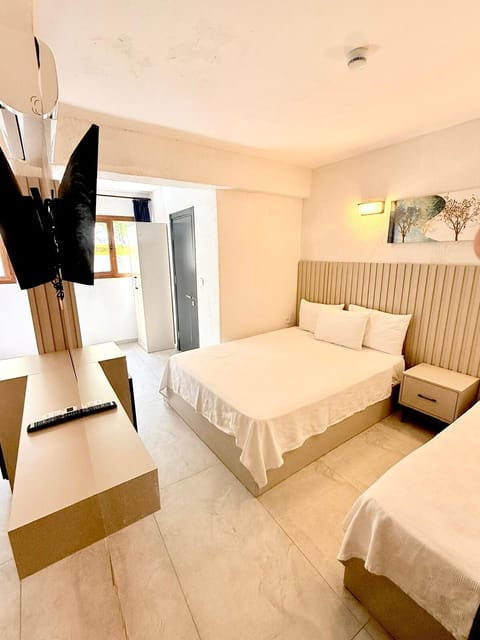 Standard Triple Room | Iron/ironing board, free WiFi, bed sheets