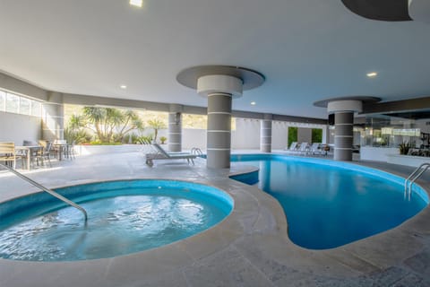 Indoor pool, sun loungers