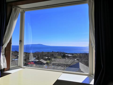 Triple Room, Ocean View | Desk, blackout drapes, soundproofing, iron/ironing board
