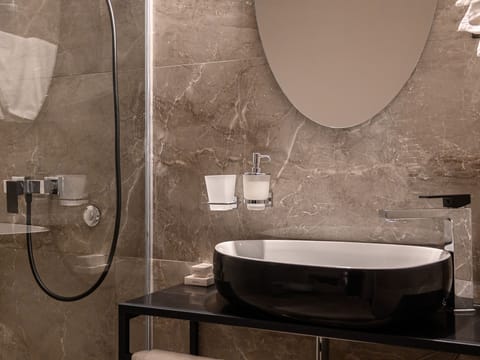 Shower, free toiletries, hair dryer, bathrobes