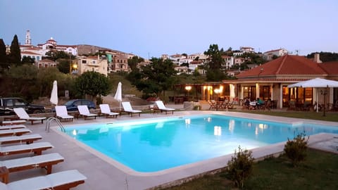 Outdoor pool, open 10:00 AM to 7:30 PM, pool umbrellas, sun loungers