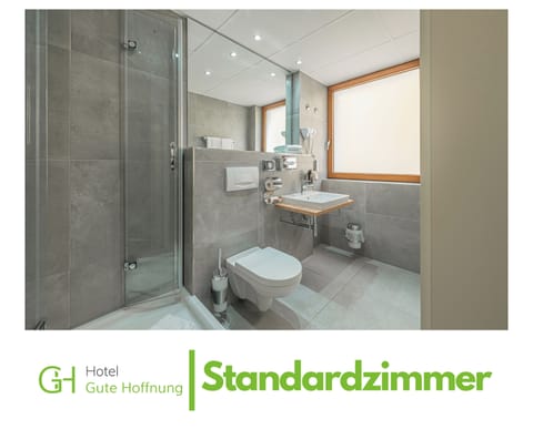 Standard Single Room | Bathroom | Hair dryer, towels, soap, shampoo