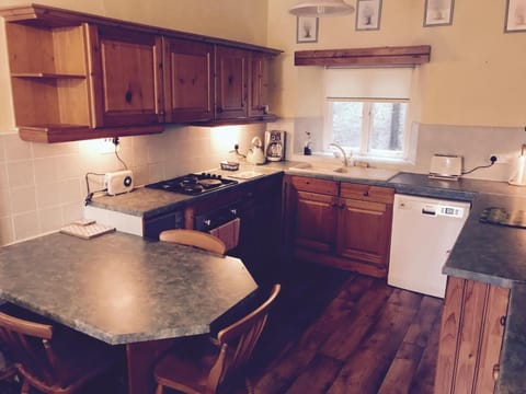 Microwave, coffee/tea maker, cookware/dishes/utensils