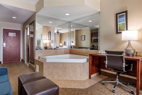 Suite, 1 King Bed, Non Smoking, Hot Tub | Desk, laptop workspace, blackout drapes, iron/ironing board