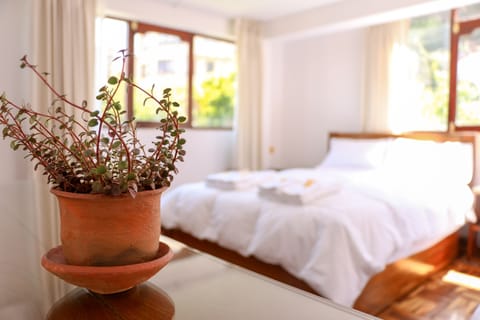 Family Room | Minibar, in-room safe, desk, soundproofing