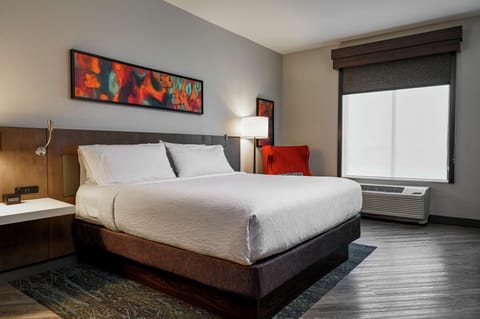 Desk, laptop workspace, blackout drapes, iron/ironing board