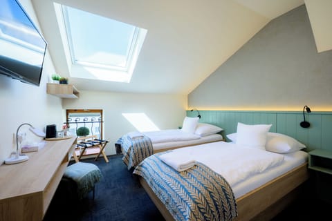 Double Room | Minibar, in-room safe, desk, iron/ironing board