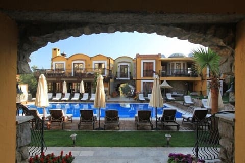 Outdoor pool, open 8:00 AM to 6:30 PM, pool umbrellas, sun loungers