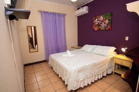 Double Room | Minibar, blackout drapes, free WiFi, bed sheets