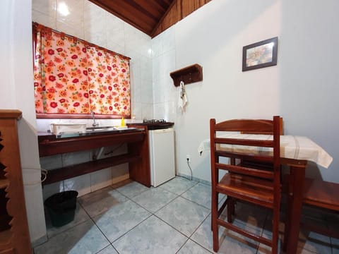 Triple Room | Private kitchen | Stovetop, highchair, cookware/dishes/utensils