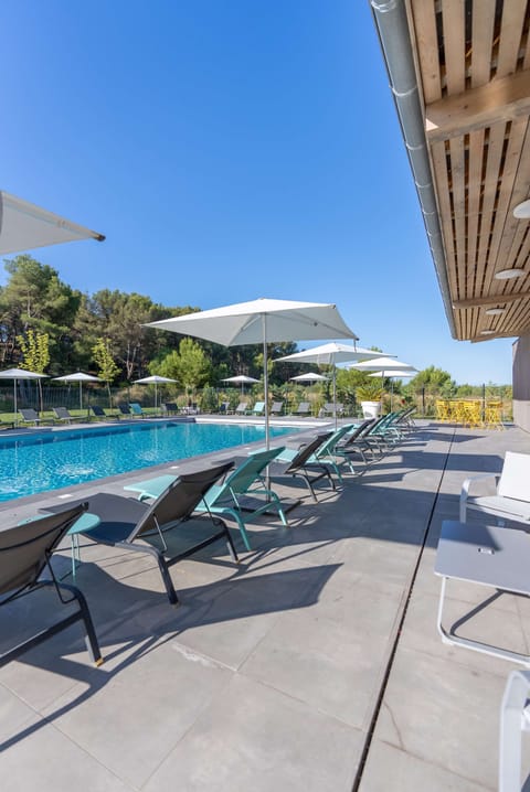 Outdoor pool, open 9:00 AM to 8:00 PM, pool umbrellas, sun loungers