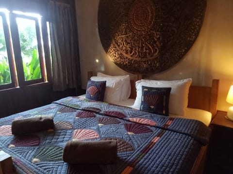 Family Suite (Coto) | In-room safe, individually decorated, individually furnished, desk