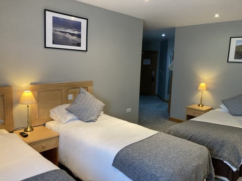 Desk, blackout drapes, iron/ironing board, cribs/infant beds