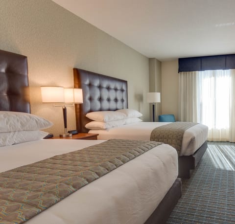 Desk, laptop workspace, iron/ironing board, free cribs/infant beds