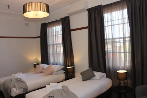 Desk, blackout drapes, free WiFi, bed sheets