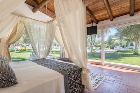 Junior Suite, Pool View (Baldacchino) | View from room