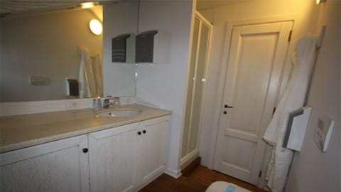 Shower, free toiletries, hair dryer, slippers