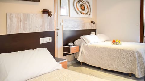 Triple Room | Memory foam beds, in-room safe, desk, soundproofing