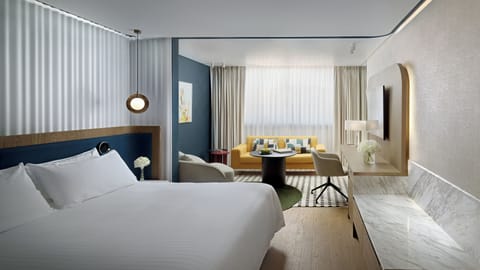 1 bedroom, hypo-allergenic bedding, down comforters, minibar