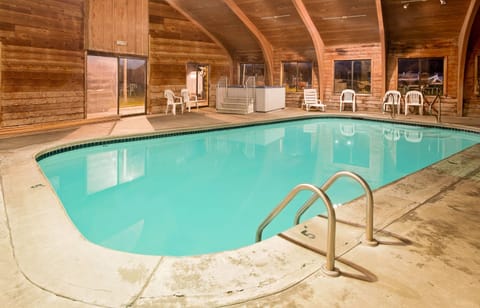 Indoor pool, open 7:00 AM to 9:00 PM, sun loungers