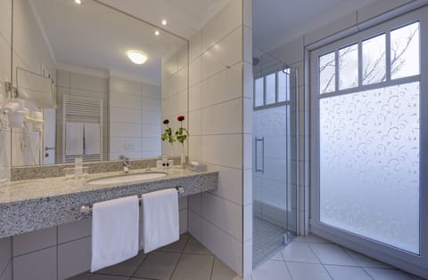 Hair dryer, towels, soap, shampoo