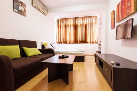Comfort Apartment, 1 Bedroom, Non Smoking, City View | Living area | Flat-screen TV, pay movies