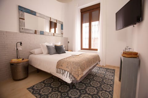 Apartment, 1 Bedroom, Ground Floor (Casa Mariana 1) | Iron/ironing board (on request), WiFi (free), bed sheets