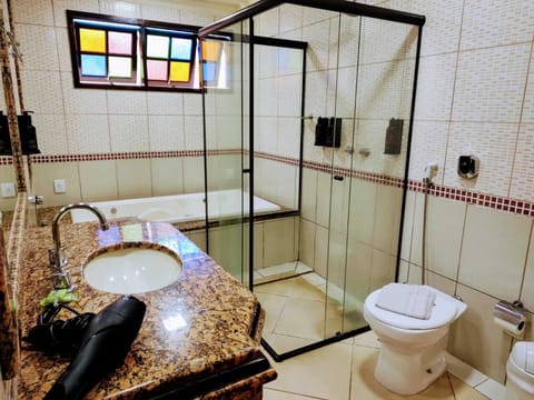 Grand Room, 1 Bedroom, Jetted Tub | Hypo-allergenic bedding, blackout drapes, free WiFi, bed sheets