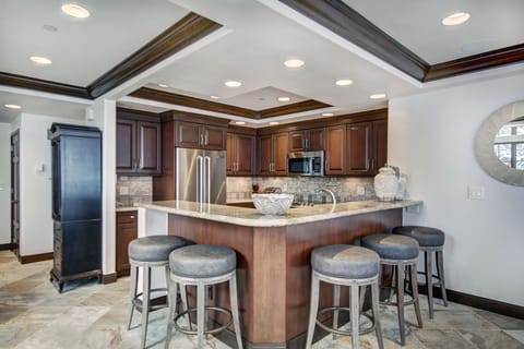 Condo, 3 Bedrooms | Private kitchen | Full-size fridge, microwave, oven, stovetop