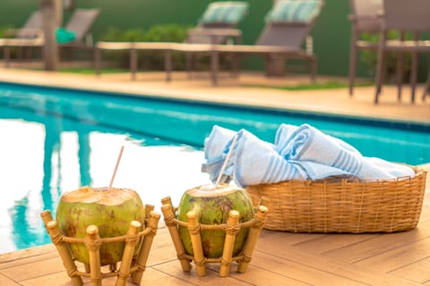 Outdoor pool, pool umbrellas, sun loungers