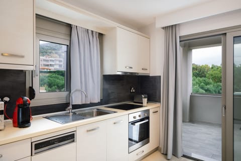 Executive Apartment, 2 Bedrooms, Sea View | Private kitchen | Full-size fridge, microwave, oven, stovetop