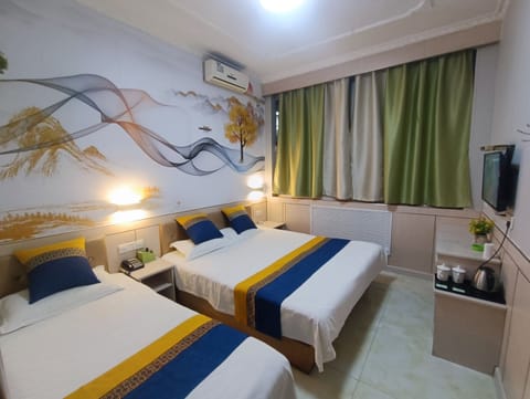 Family Room | Premium bedding, down comforters, memory foam beds, desk