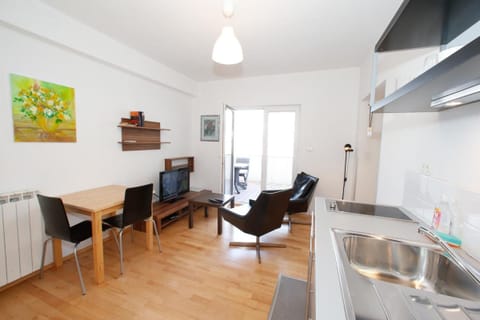 Flat-screen TV, pay movies