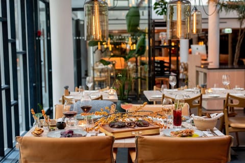 Breakfast, lunch, dinner served; local cuisine 