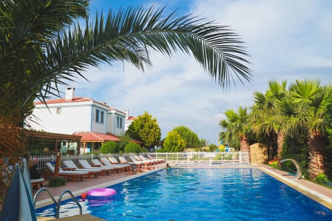Outdoor pool, pool umbrellas, sun loungers